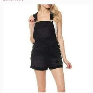 Black distressed overall shorts sized large